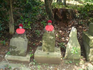 Statues along the route - Where is my interpreter??  Hand made knit hats, what is the significance?