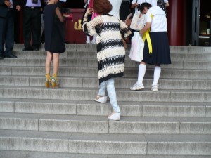 For as many men in black suits and white shirts, there are women in heels.  The ballet flat does not exist in Japan...well at least not this season...